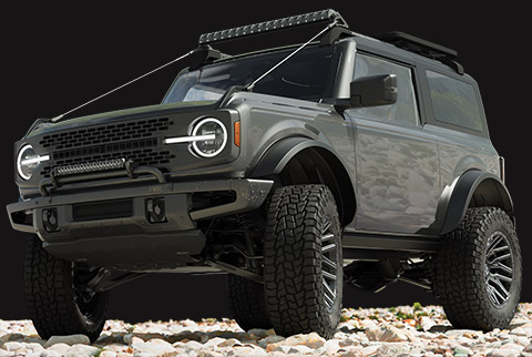 image of a Ford Bronco on a shoreline with Hercules Tire TerraTrac<sup>®</sup> AT X-Journey tires installed